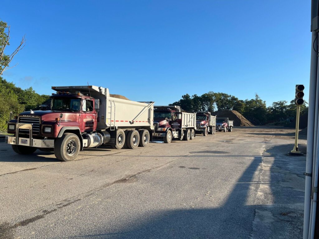 TRUCKS LINED UP AT THE PIT